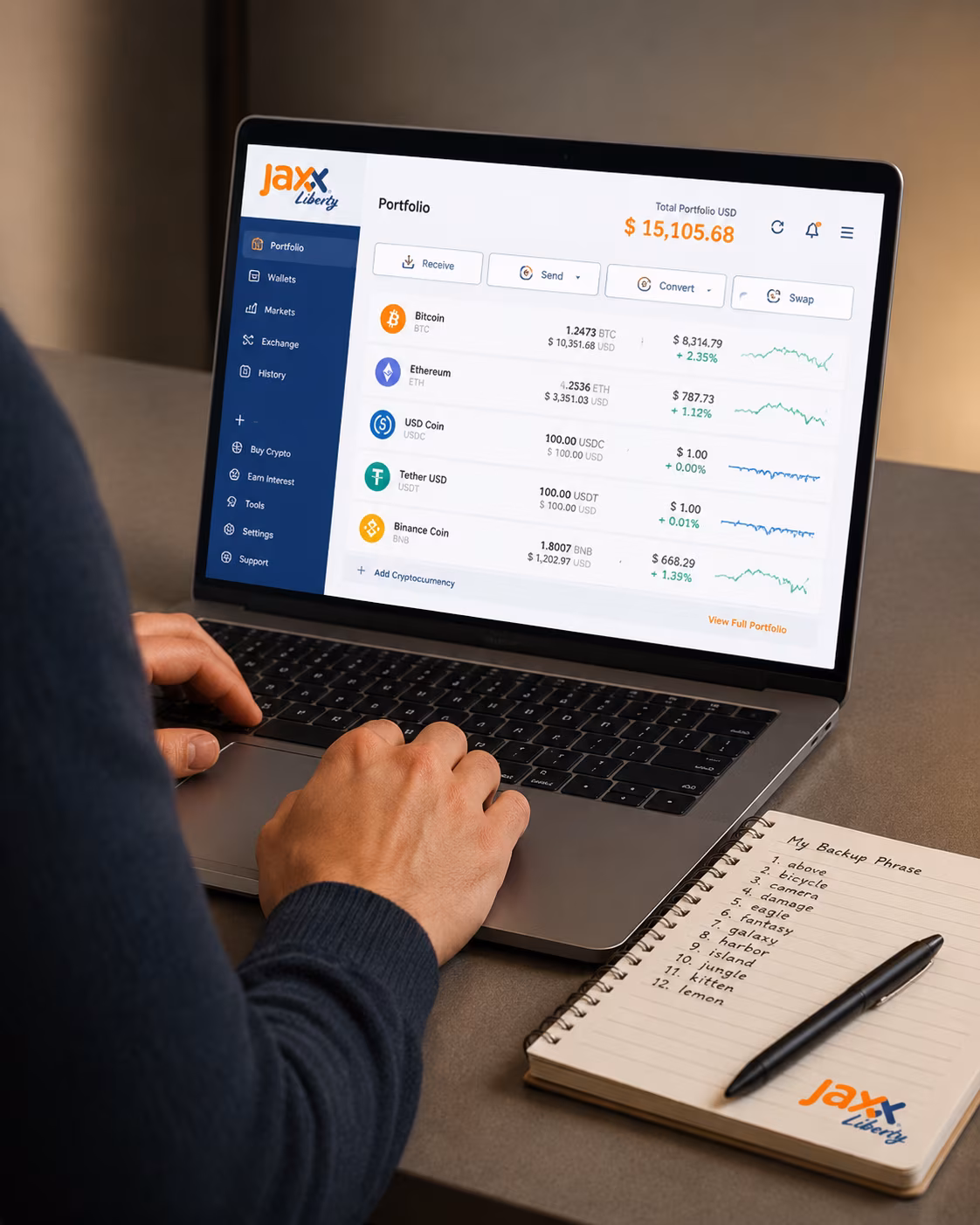 Security-focused user setting up Jaxx Liberty wallet on laptop