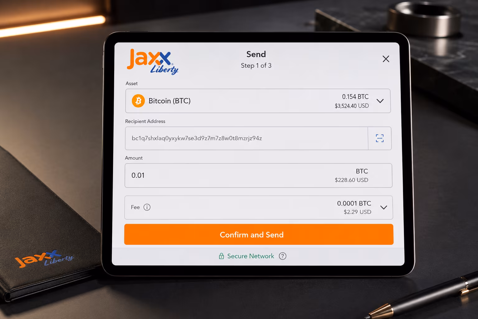 Jaxx Liberty send screen showing asset selection and confirm button